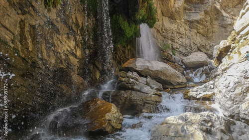 waterfall flowing in nature, cascade, cascade between rocks. Hakkari in Turkey
