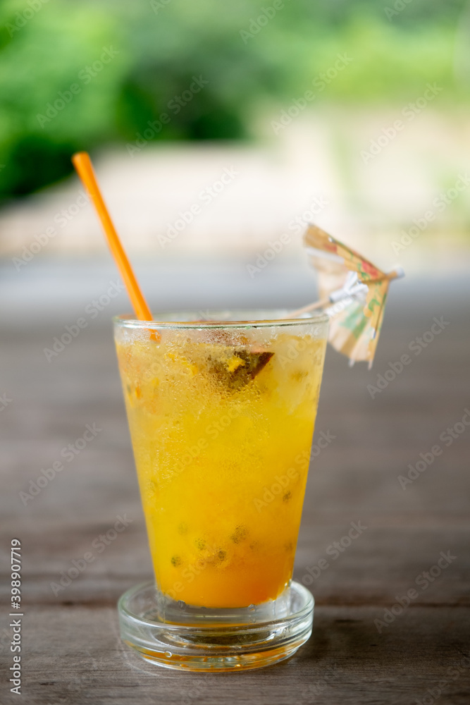 Passion fruit juice with ice in outdoor cafe