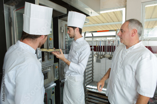 team of chefs working in a commercial kitchen