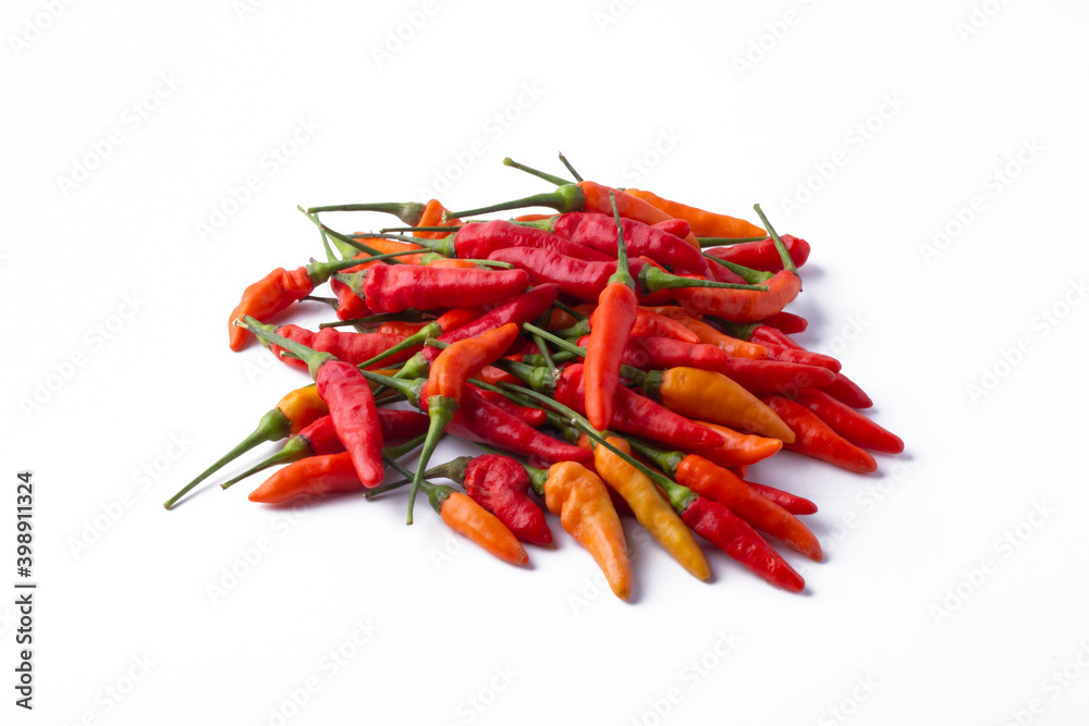 Red yellow chili peppers on white background
