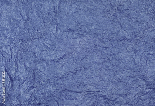 Texture of crumpled blue craft tissue paper