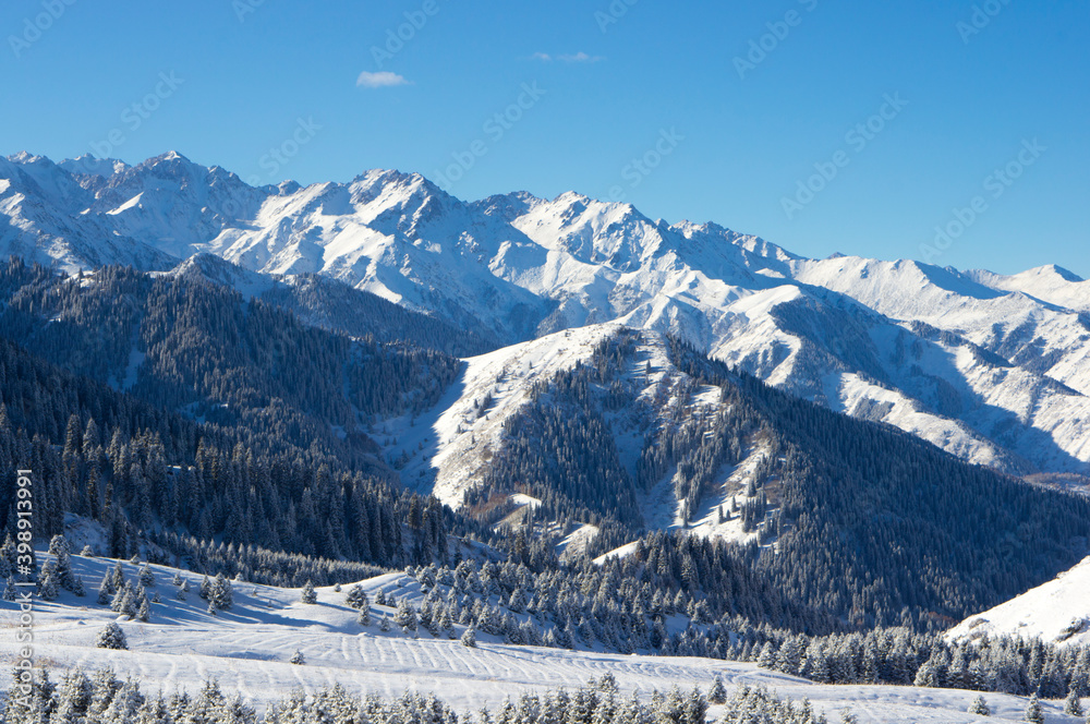 Beautiful mountain winter landscape. Snowy landscape in the mountains of Kazakhstan.