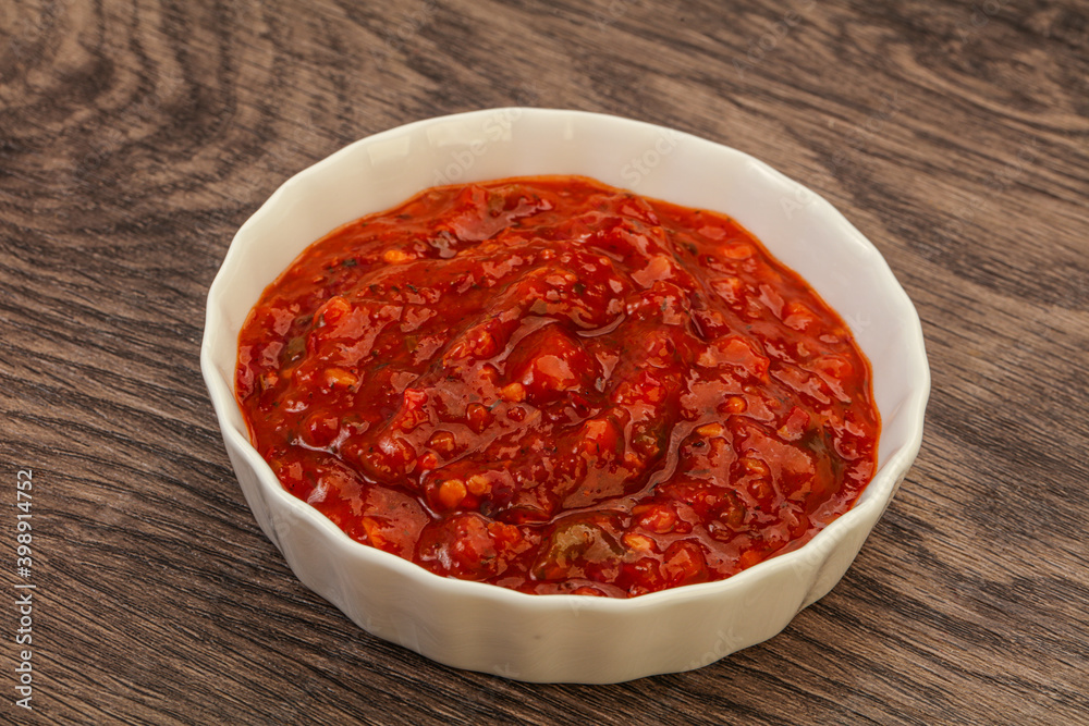 Tomato spicy sauce in the bowl Tomato spicy sauce in the bowl
