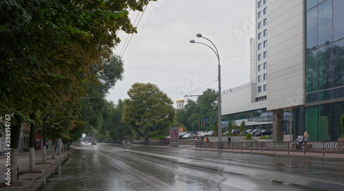  On Bolshaya Sadovaya, after the rain, moving cars and citizens photo