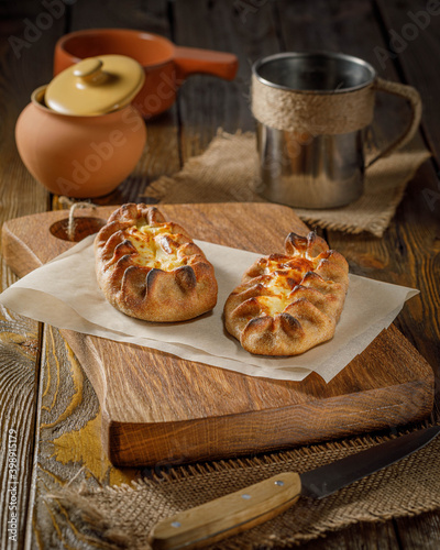 Finnish Traditional Pasties Or Pirogs - Karelian Pasties, Karelian Pies Or Karelian Pirogs From Region Of Karelia. photo