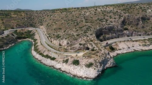 Aerial drone video of Tunnel in Athens riviera seaside road known as hole of Karamanlis or 