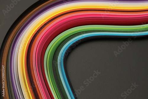 Rainbow color strip wave paper. Abstract texture horizontal black background.