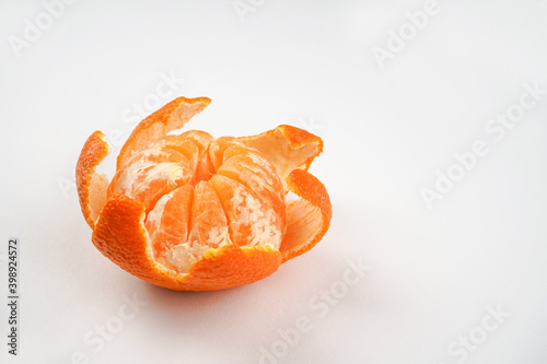 Mandarin on white background. Close-up, copy space. Recipe, diet, nutrition concept.