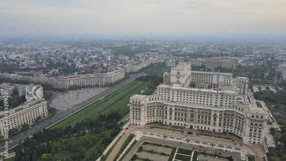 Aerial view cityscape Palace of the Parliament, Bucharest historical communist building for the Parliament of Romania central administration landmark tourism monument. Communism history sunset skyline Aerial view cityscape Palace of the Parliament, Bucharest historical communist building for the Parliament of Romania central administration landmark tourism monument. Communism history sunset skyline