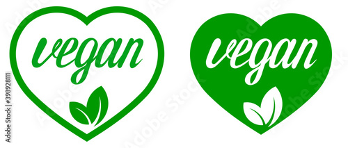 Vegan. Plant based vegeterian food product label. Green heart-shaped stamp. Logo or icon. Diet. Sticker. Hand-drawn lettering. Calligraphy