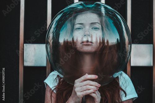 The girl has an aquarium on her head. Portrait