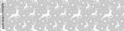 Seamless pattern with Christmas icons. Reindeers and stars. Vector