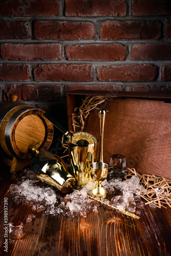 Set of bar or pub accessories with martini cocktail shaker. Set for the bartender Bar spoon, jiger, strainer photo