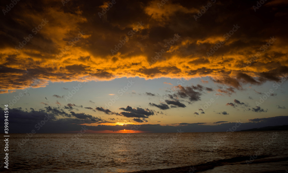 Sunset by the sea