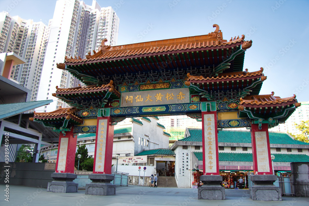 Kowloon, Hong Kong - 02.12.2020 : traditional Chinese architecture, Religion gate near Wong Tai Sin Temple, Buddhist and Taoist temple Kowloon, Hong Kong - 02.12.2020 : traditional Chinese architecture, Religion gate near Wong Tai Sin Temple, Buddhist and Taoist temple