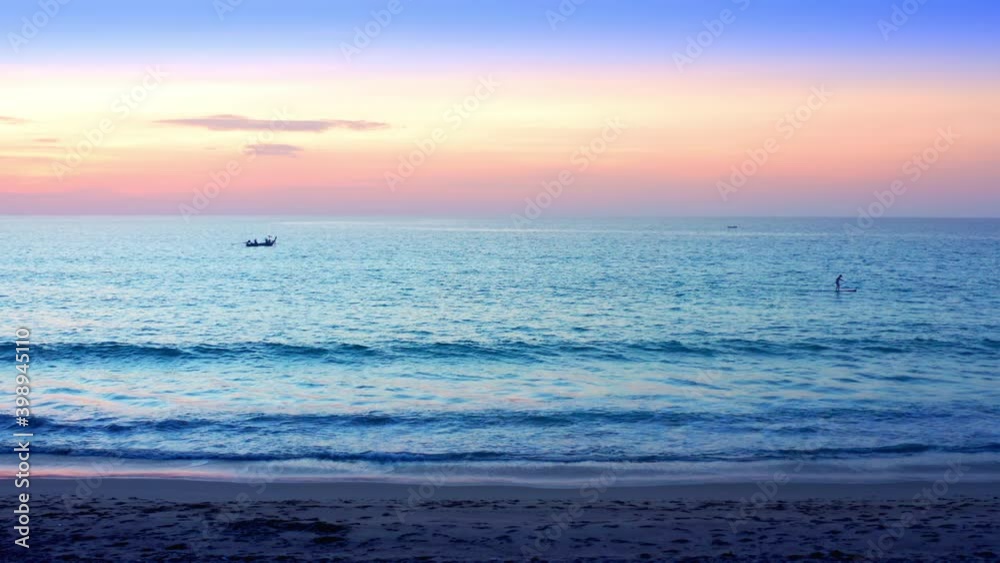 4K Beautiful tropical beach with sunset sky. Beautiful Phuket beach is famous tourist destination at Andaman sea summer concept. Areal drone view tropical beach with sunset over the sea 4K Beautiful tropical beach with sunset sky. Beautiful Phuket beach is famous tourist destination at Andaman sea summer concept. Areal drone view tropical beach with sunset over the sea