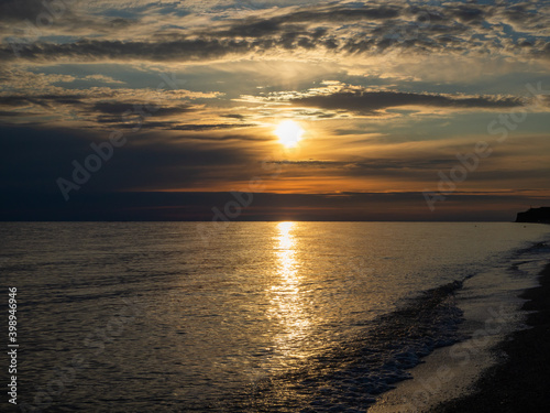 Beautiful summer sunset over the sea and beach.