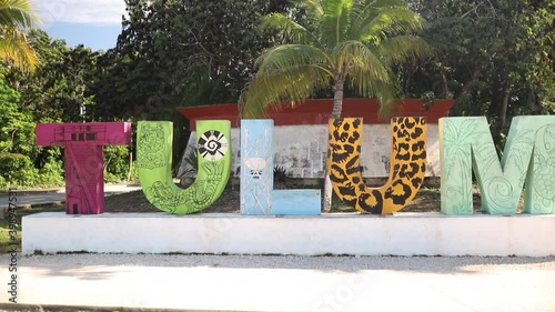 Shot Moving Towards Big Tulum Sign and Then Spinning Around with Palm Trees