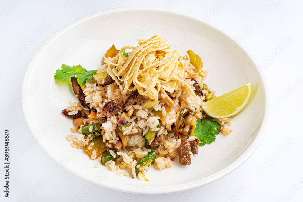 fried rice with eat and vegetables
