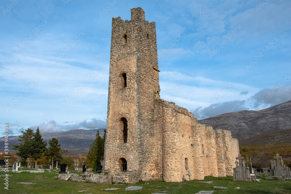 CROATIA, November 2020 - Medieval orthodox church of St. Spas and the old cemetery near the Cetina river source.