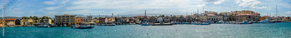 A panorama view of moorings in the inner harbour of Chania, Crete on a bright sunny day