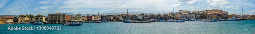 A panorama view of moorings in the inner harbour of Chania, Crete on a bright sunny day