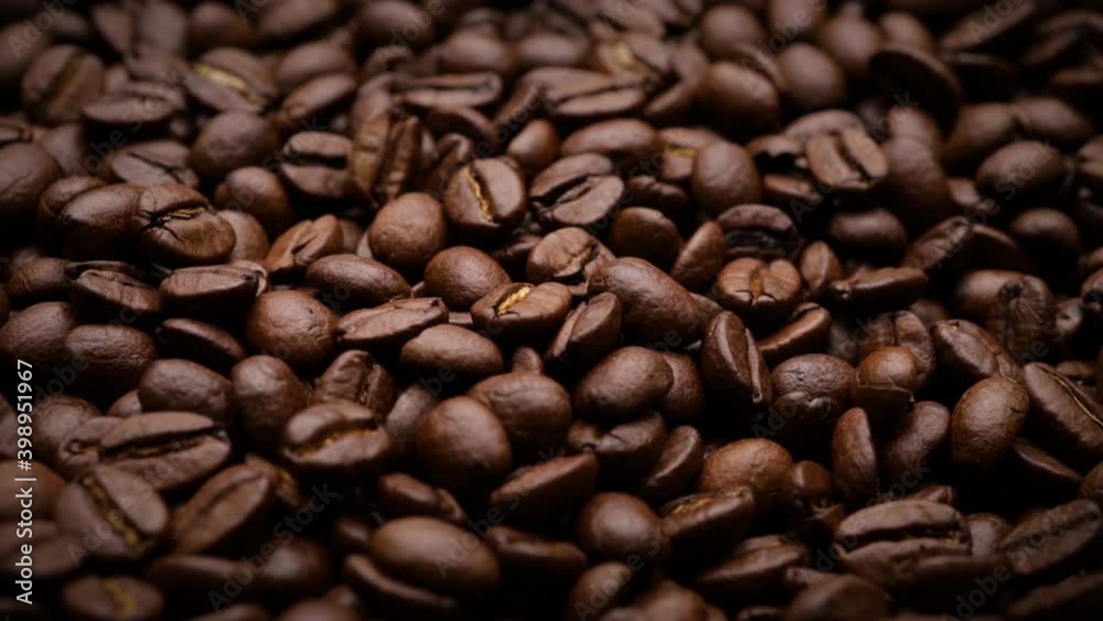 fresh roasted coffee beans background (dolly shot) fresh roasted coffee beans background (dolly shot)