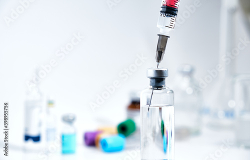 syringe and vials. Vaccine for coronavirus on white background.