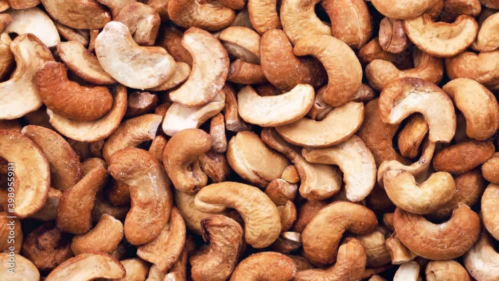 Rotating cashew nuts peeled full. View from above. Rotating cashew nuts peeled full. View from above.
