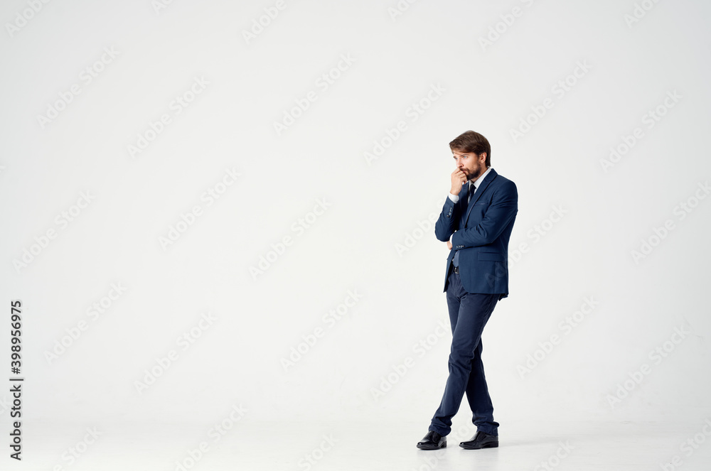 elegant guy in a classic suit and gesturing with his hands business finance elegant guy in a classic suit and gesturing with his hands business finance