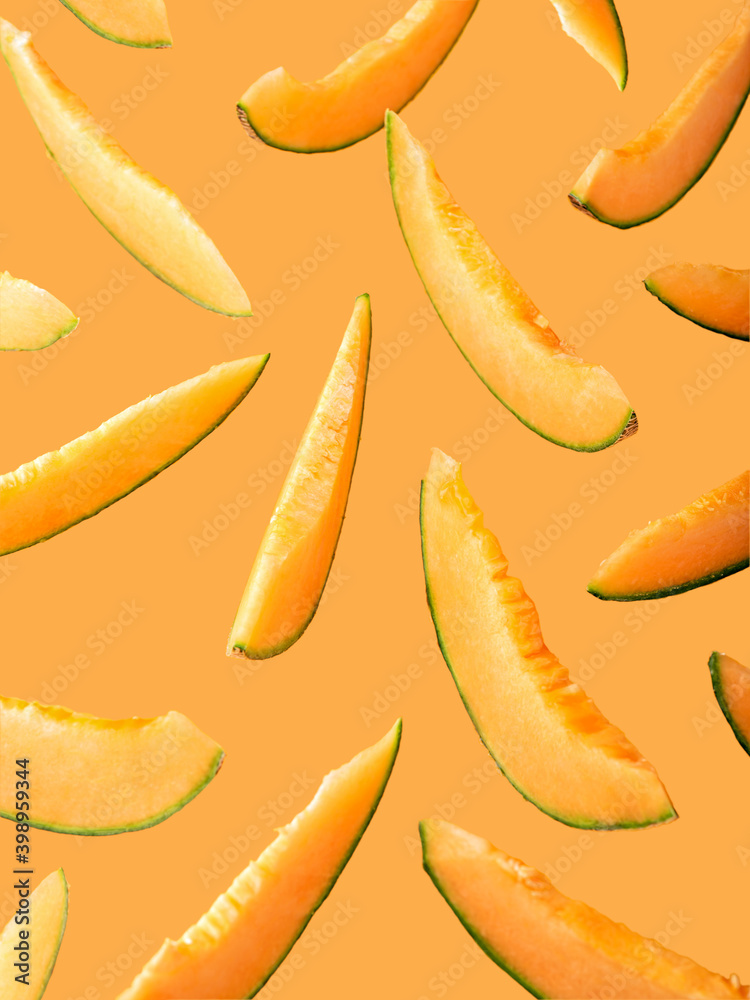 Slices of cantaloupe melon on marigold background. Slices of cantaloupe melon on marigold background.