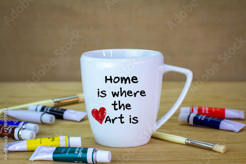 Fotografie Home is where the art is hand painted on to a mug, creativity, using craft to make sustainable gifts and have fun