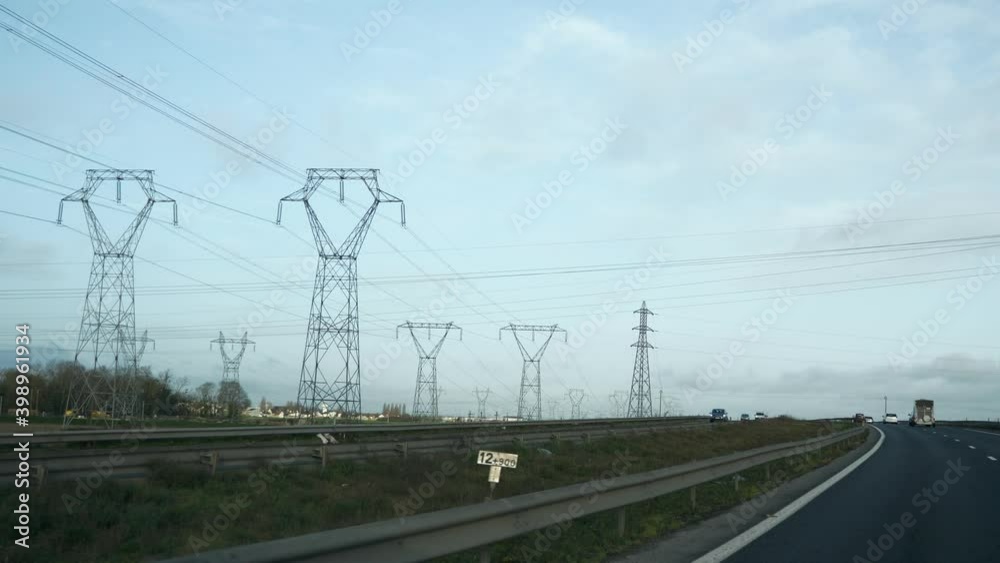 Moving Along Transmission Line. Electric Power Transmission. High Voltage Power Line. Cloudy Sky. Spring. 2x Slow motion 60 fps 4K Moving Along Transmission Line. Electric Power Transmission. High Voltage Power Line. Cloudy Sky. Spring. 2x Slow motion 60 fps 4K