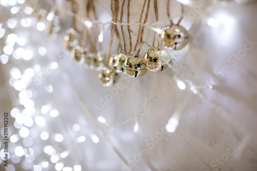 Christmas decoration on the wall. lights and Christmas garland. Empty texture or background