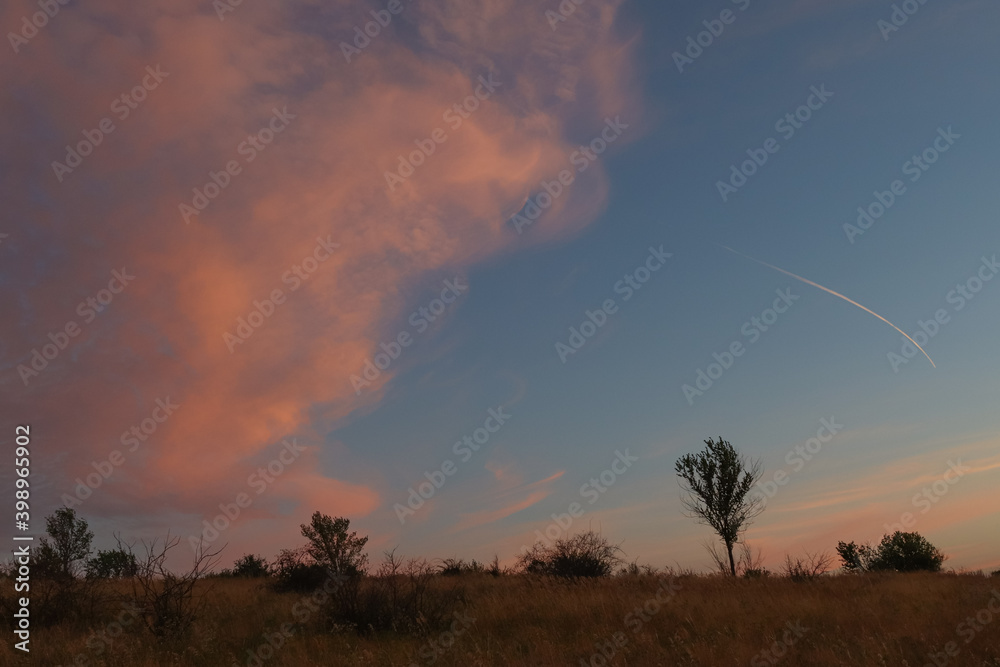 beautiful morning clouds in the sky in the steppe
