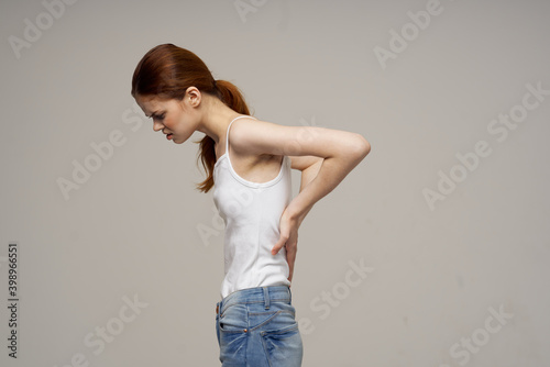 woman holding lower back health problems medicine therapy massage