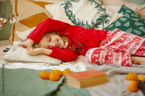 Cute little girl in New Year's pajamas