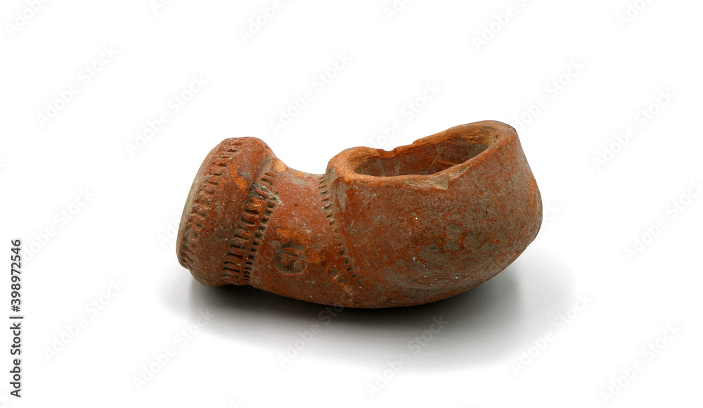 Fototapeta premium antique clay smoking pipe on white background