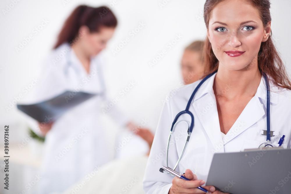 Two woman nurse watching X Ray image, standing in hospital. X Ray . Two woman doctor Two woman nurse watching X Ray image, standing in hospital. X Ray . Two woman doctor
