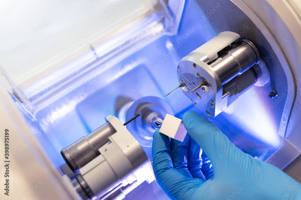 CAD CAM dental computer-aided machine. Digital modern dental laboratory ...