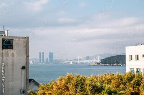 View of Gwangan bridge and blue ocean from Haeundae Dalmaji-gil Moontan Road in Busan, Korea photo