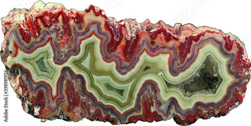 sliced agate crystal gemstone in red and green isolated on white background