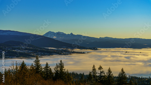 sunrise in the mountains and cloud inversion on valley floor © Andrew