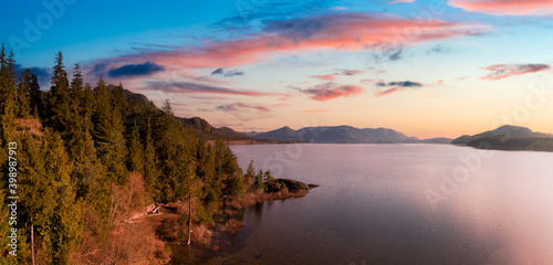 Beautiful Aerial Panoramic View of Kennedy Lake. Colorful Sunset Sky. Located on the West Coast of Vancouver Island near Tofino and Ucluelet, British Columbia, Canada. © edb3_16