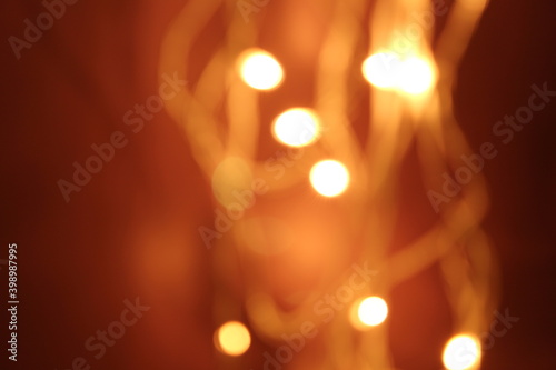 Blurred yellow and orange lights bokeh effect background 
