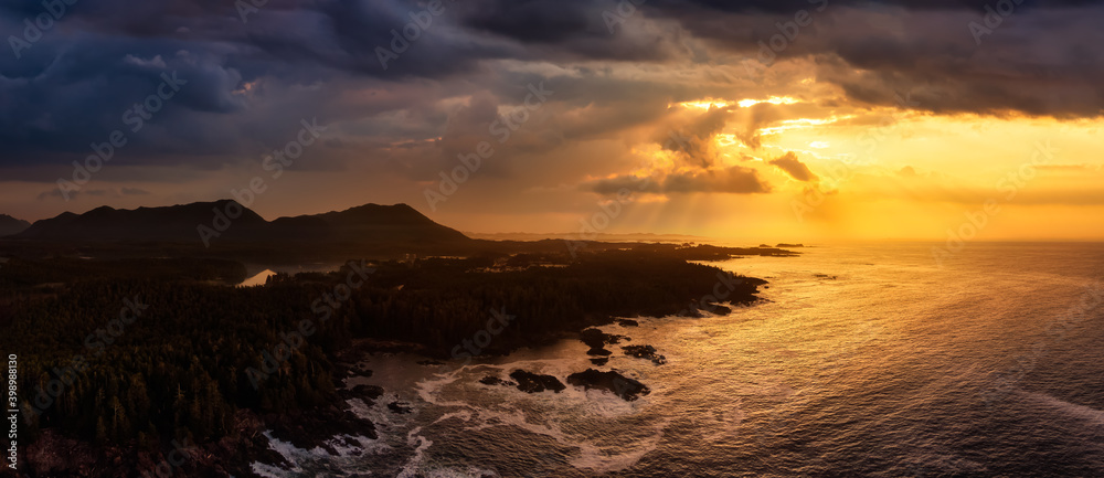Ucluelet, Vancouver Island, British Columbia, Canada. Aerial Panoramic View of a Small Town near Tofino on a Rocky Pacific Ocean Coast. Dramatic Stormy Sunrise Sky.