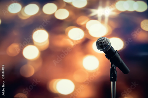 Public speaking backgrounds, Close-up the microphone on stand for speaker speech at seminar room with technology blur bokeh light background and.