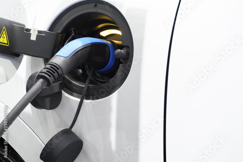 E-power car concept, car electric power charging, EV car concept, technology power of the car, close up EV charging.