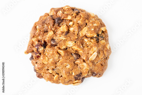 Homemade tasty oatmeal cookies with raisins, dried cranberry and Himalayan mango seeds. Healthy snack concept. Sweet dessert. Close up image.