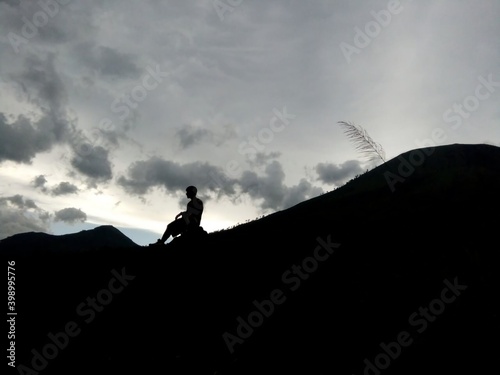 silhouette of a person at Guntur Mountain